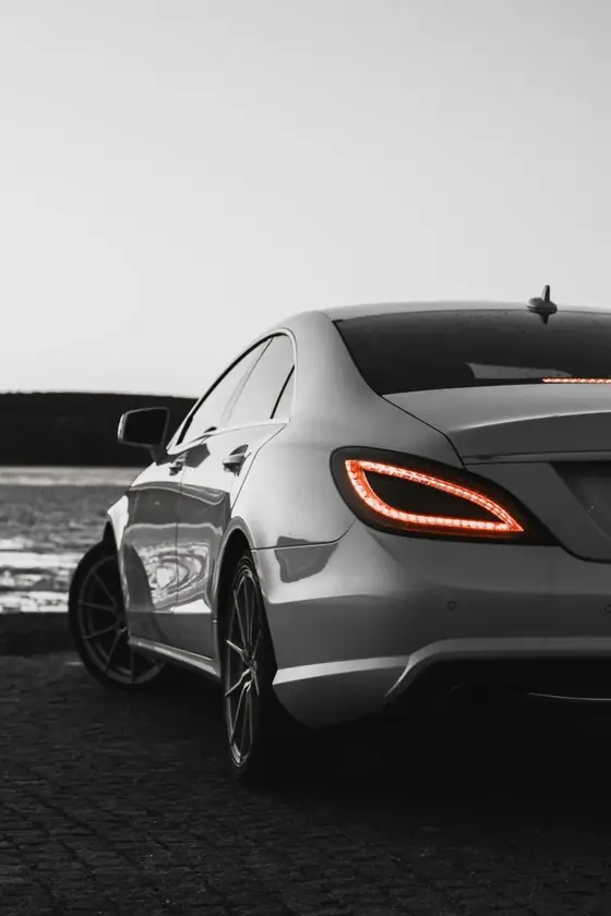Silver Mercedes-Benz CLS sedan in black and white