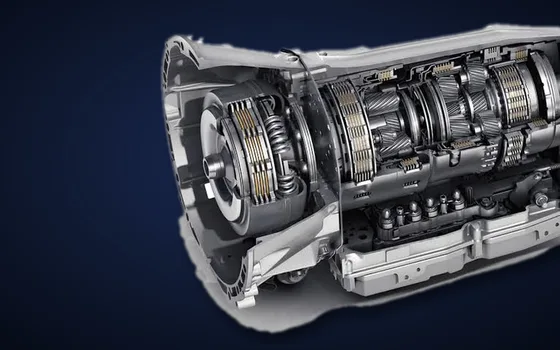 Cutaway of a Mercedes-Benz 7G-TRONIC automatic transmission on a dark blue background