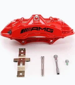 Mercedes-AMG brake caliper with its pad retaining spring, guide pins and bolt