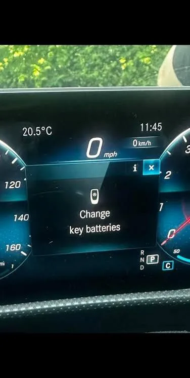 Newer Mercedes-Benz digital cluster showing the Change key batteries message