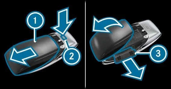 Diagram showing how to slide out the mechanical key and open the back cover of a newer Mercedes-Benz key