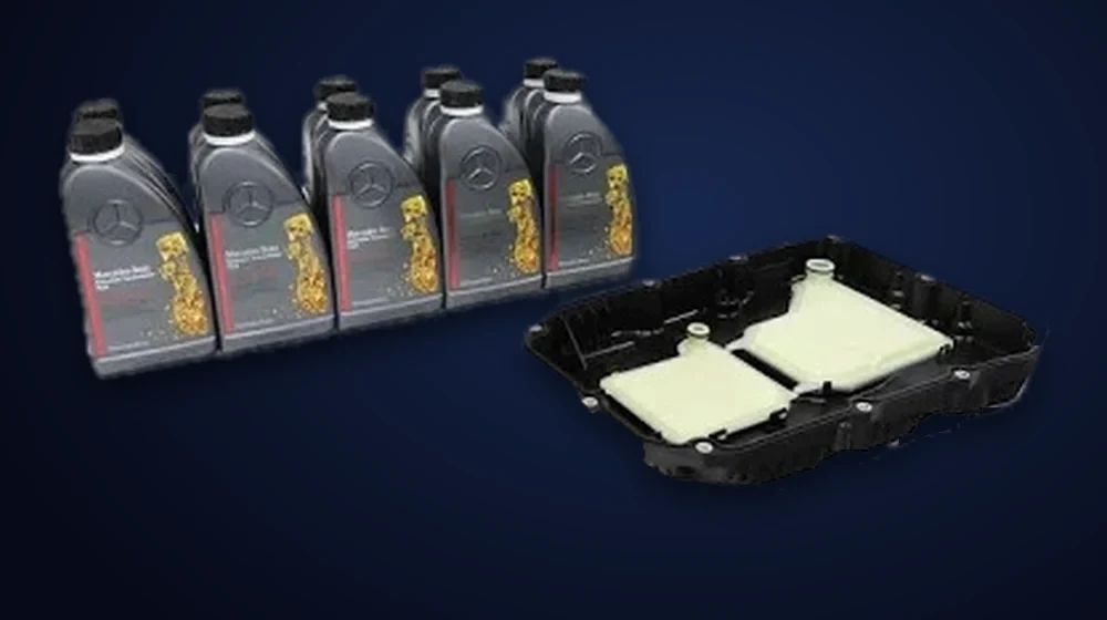 Mercedes-Benz 725 9G-TRONIC transmission service parts: bottles of factory fluid, and a new transmission pan with the filter built in